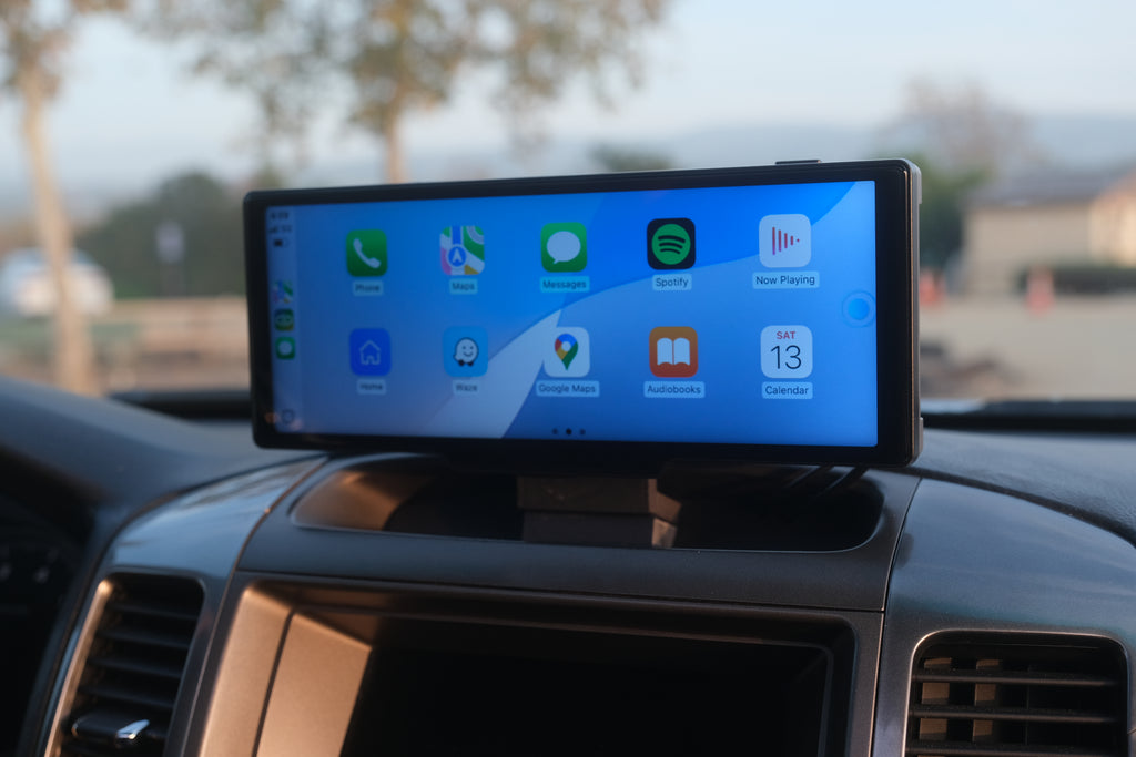 View from the passenger side of an installed Carplay mount and screen